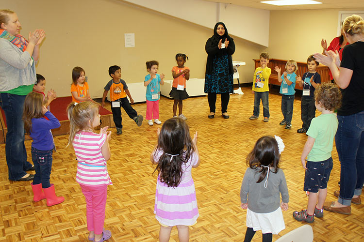 Children and educators participating in a Get Ready for School group activity